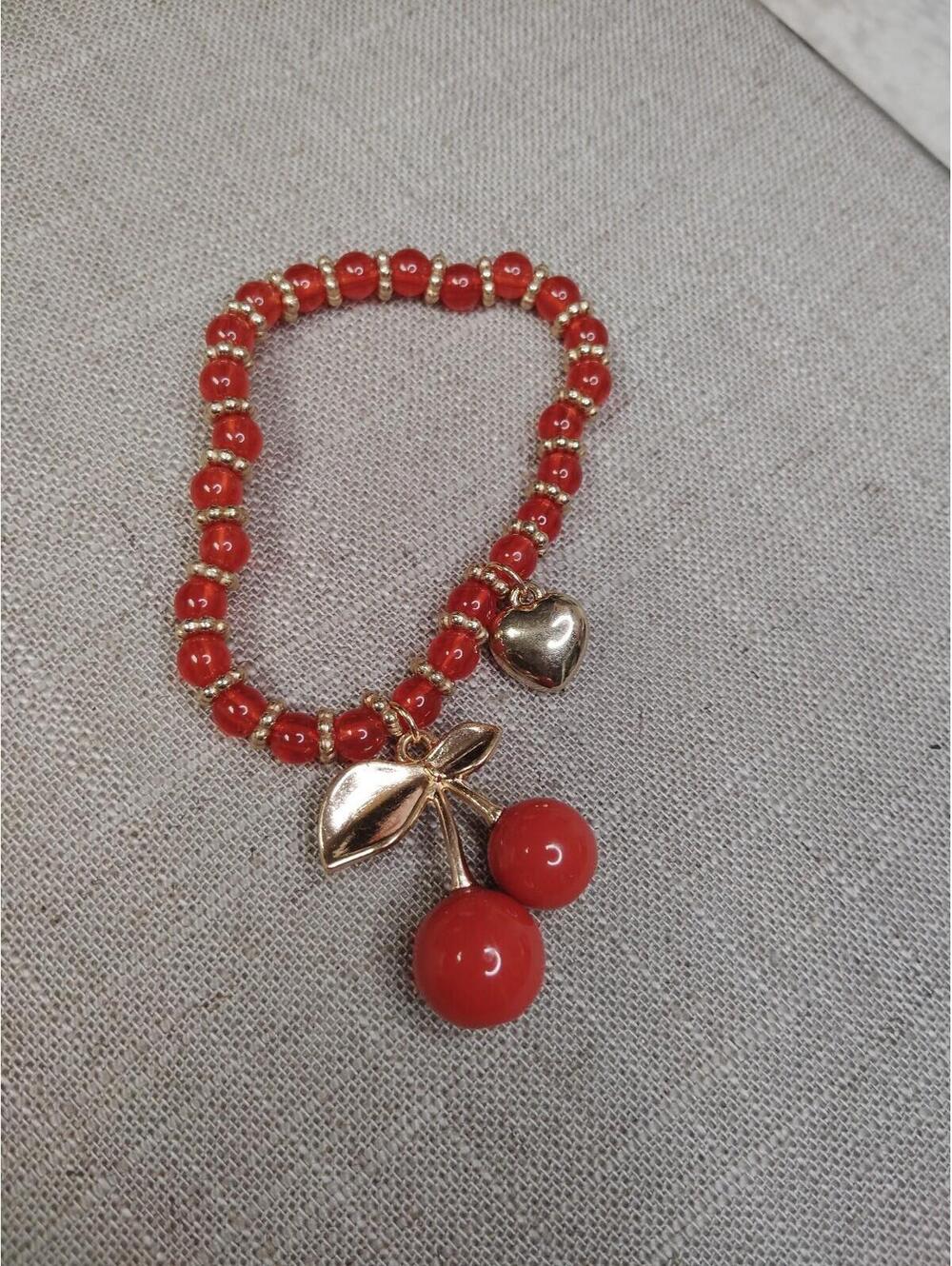 Red plastic cherry charm bracelet